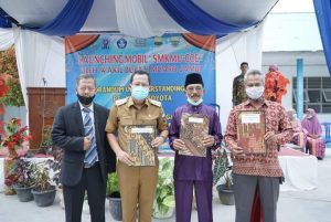 Wabup BBS Hadiri Launching Mobil Esemka MU-COE SMK Muhammadiyah Sungai Bahar dan Penandatanganan MoU dengan PT Agung Toyota Jambi.