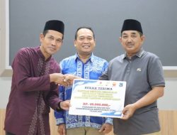 Bupati Tanjabbar Hadiri Penyerahan Bantuan dari Petrochina untuk warga Korban Kebakaran Teluk Nilau